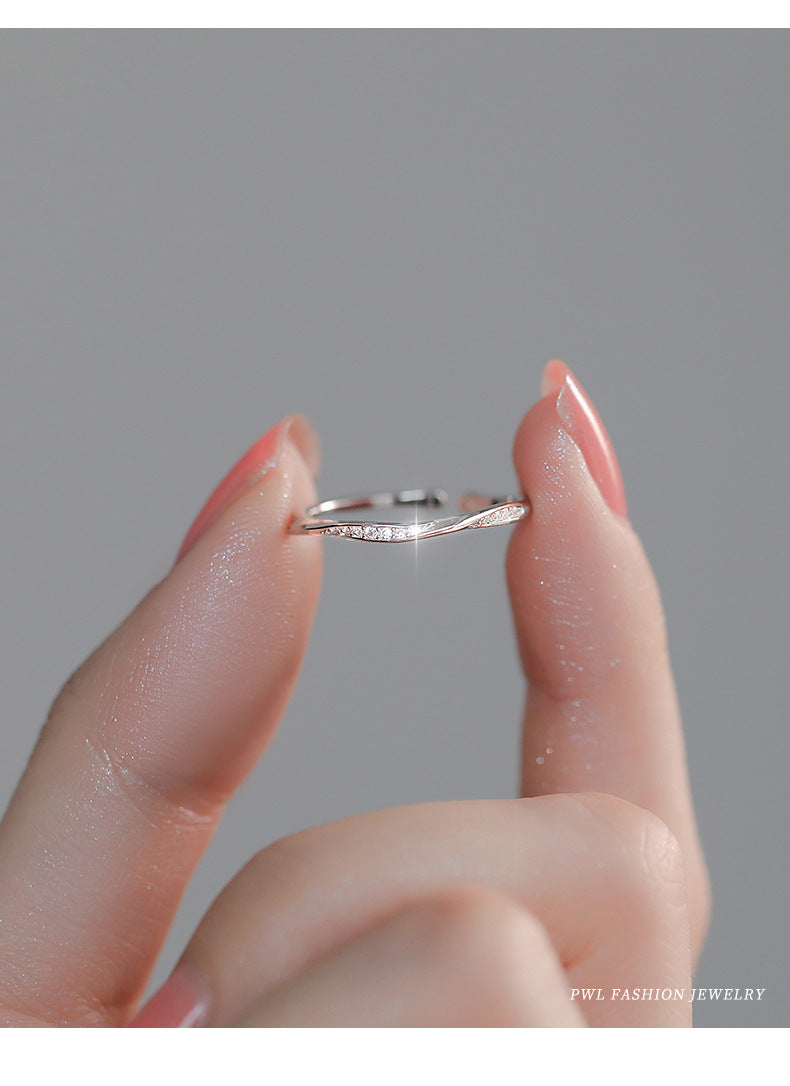 Damen Offener Ring mit elegantem Wellendesign und funkelnden Zirkonia Shop Nory