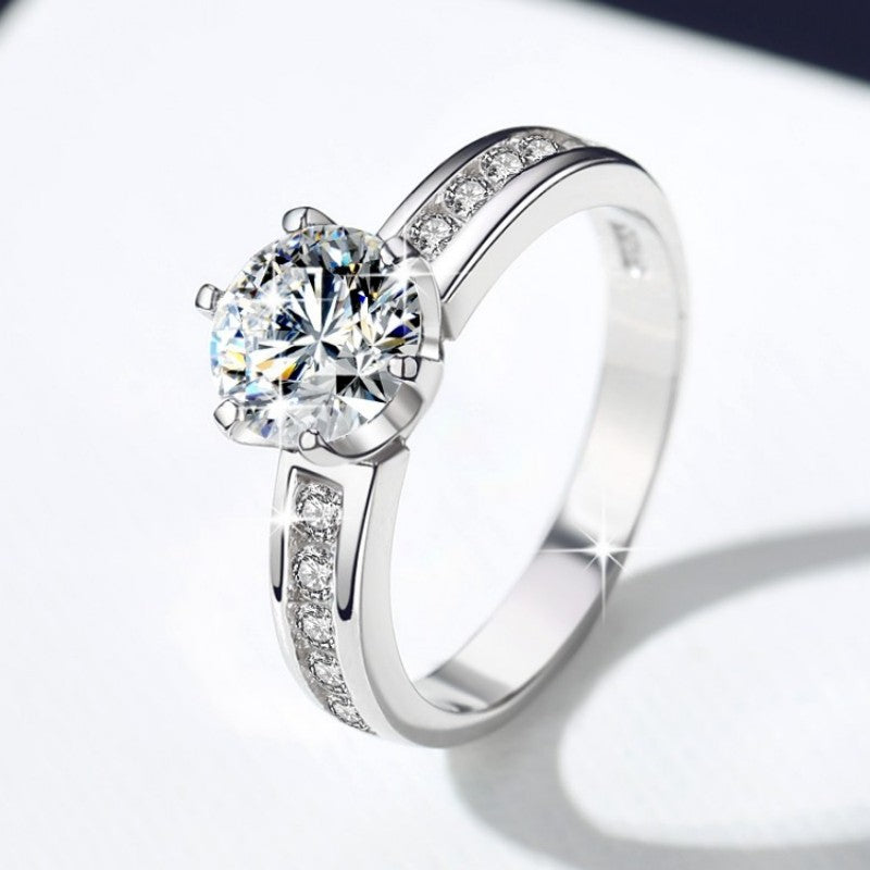Damen-Verlobungsring mit strahlendem Hauptstein und filigranem Zirkonia-Besatz Shop Nory