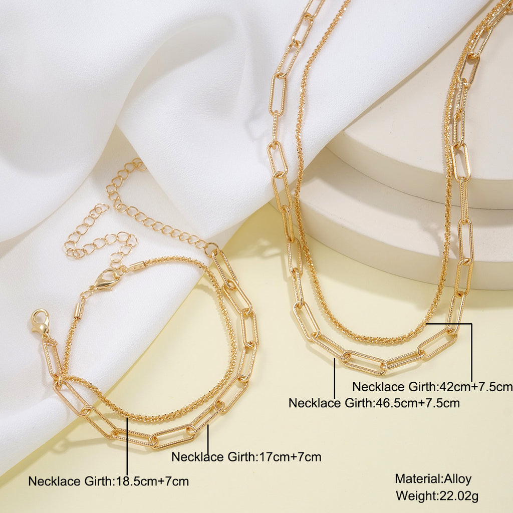 Damen Halskette und Armband Set mit modernen Glieder- und Zirkonia-Details Shop Nory