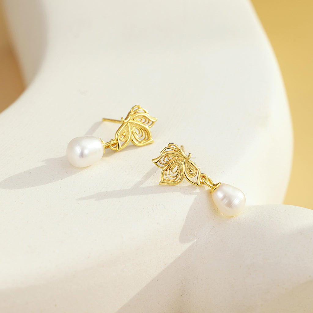 Damen elegante Ohrringe mit filigranem Schmetterlingsdesign und Perlenanhängern Shop Nory