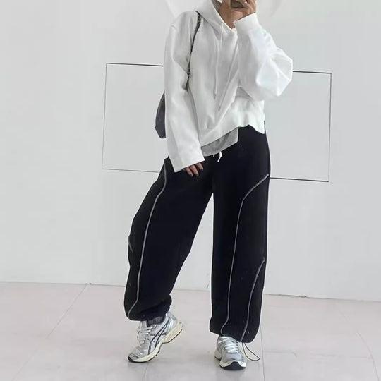 Damen Weite Sweatpants mit kontrastierenden Nahtdetails und Kordelzug Shop Nory