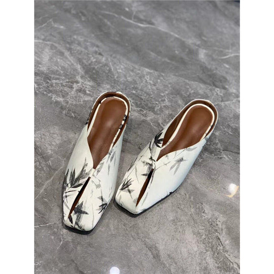 Damen fersenfreie spitz zulaufende Jacquard-Mules mit floralem Metallic‑Muster und flachem Absatz Shop Nory