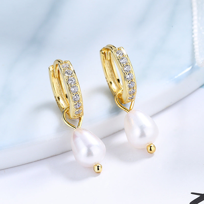 Damen Ohrringe mit eleganten Zirkonia-Verzierungen und Perlenanhängern Shop Nory