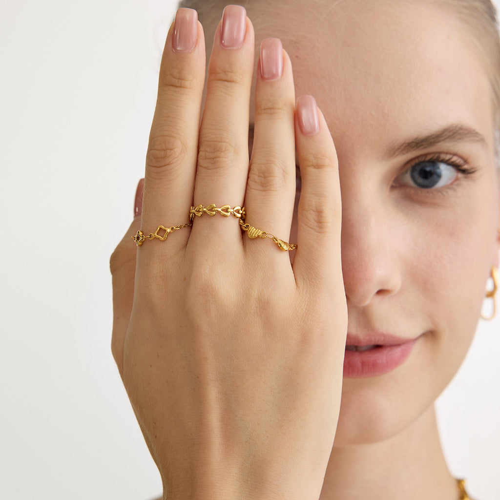 Damen Armband mit eleganten herzförmigen Elementen aus hypoallergenem Edelstahl Shop Nory