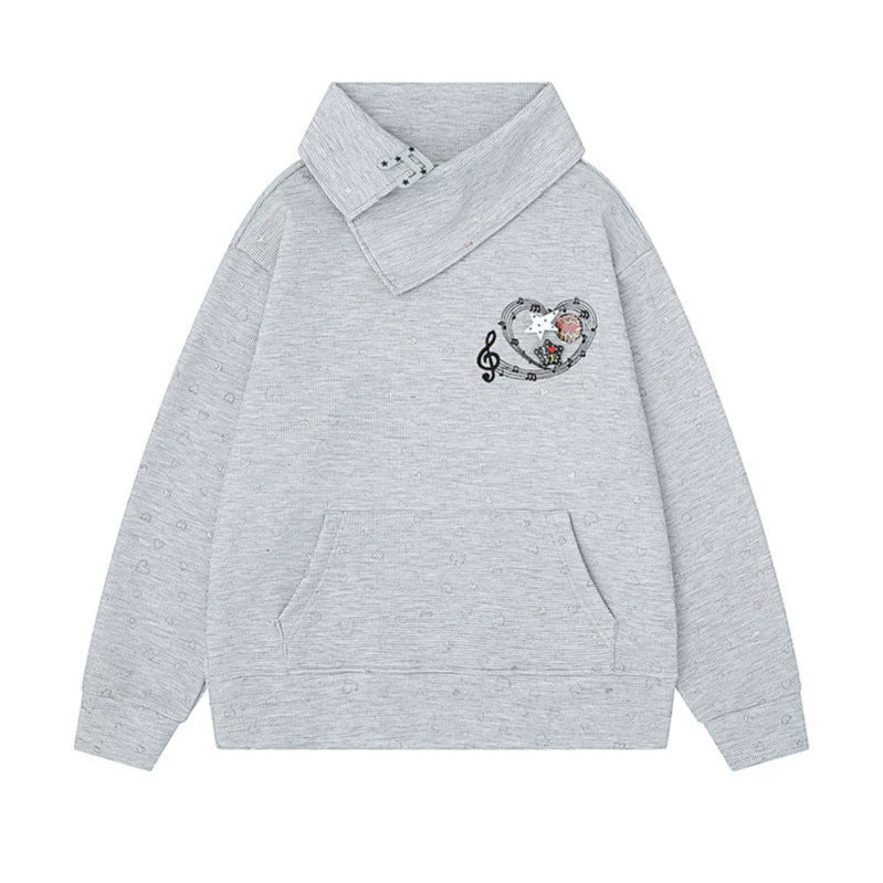 Damen Oversize-Sweatshirt mit asymmetrischem Stehkragen, Kängurutasche und musikalischer Herz-Stickerei Shop Nory