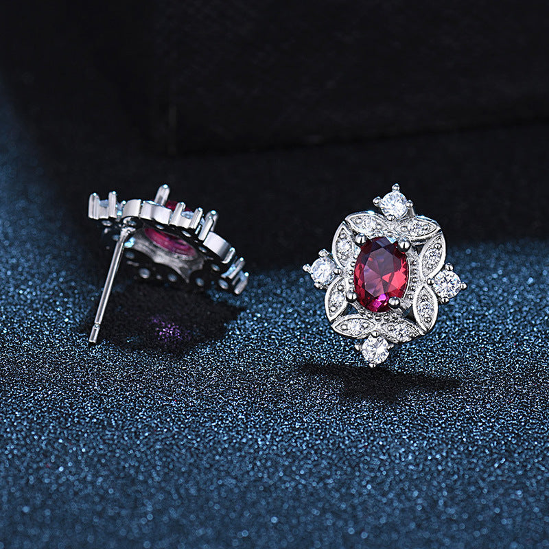 Damen Ohrringe mit kunstvollem Detail und funkelnden Zirkonia Shop Nory