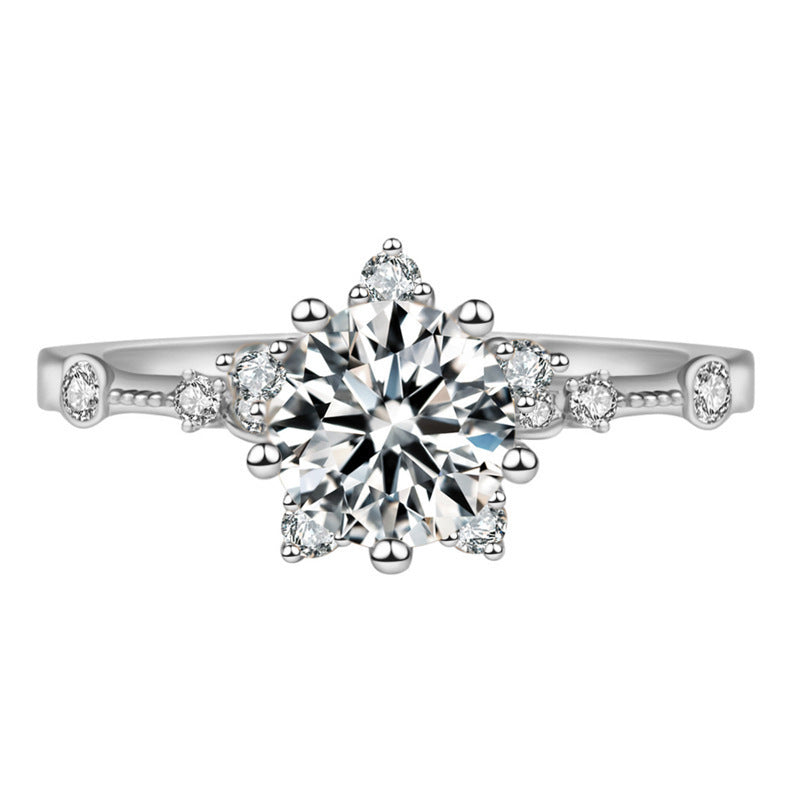 Damen Verlobungsring mit floralem Design und funkelndem Zirkonbesatz Shop Nory
