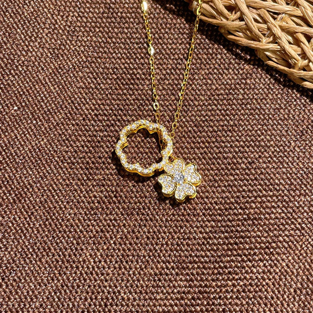 Damen Halskette mit kunstvollem floralen Anhänger und funkelnden Zirkonia Shop Nory