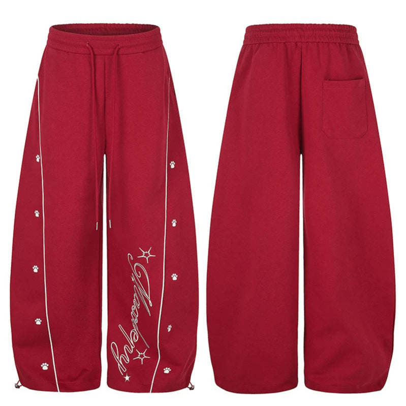 Damen Lockerfallende Palazzo‑Sweathose im Athleisure‑Look mit Tunnelzugbund und Script‑Print Shop Nory