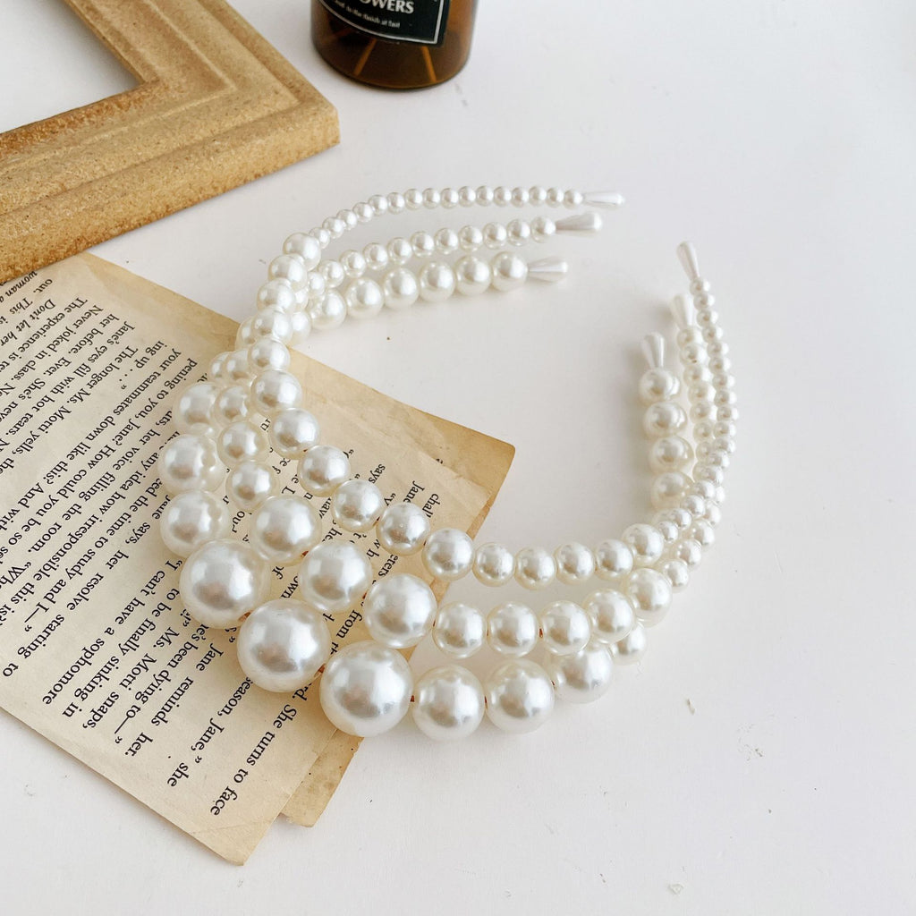 Damen Haarband mit eleganten Perlenakzenten Shop Nory