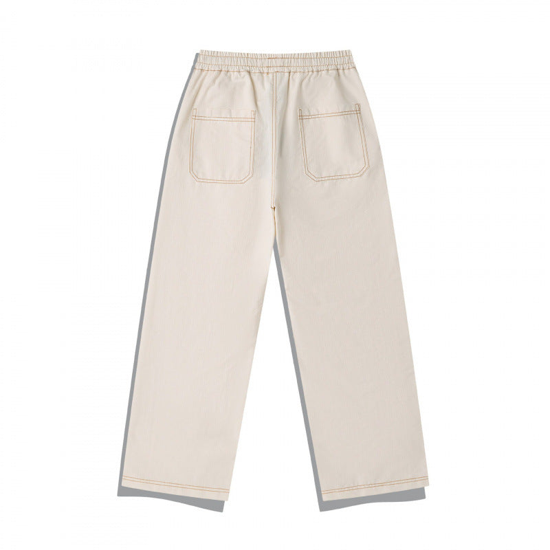 Unisex Weite Denim-Hose mit elastischem Bund, Kordelzug und gesteppter Kniepasse Shop Nory