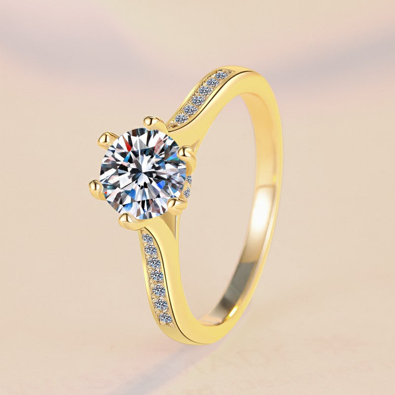 Damen Verlobungsring mit funkelndem rundem Zirkonia und luxuriösem Goldrahmen Shop Nory