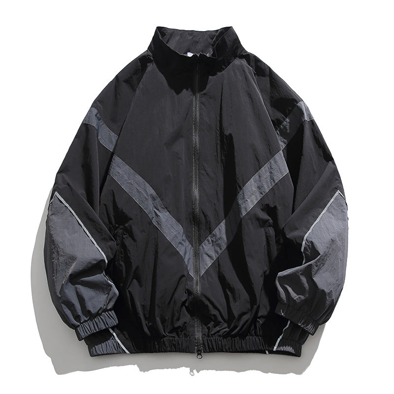 [Unisex] Oversize technische Wind- und Regenjacke mit Stehkragen, reflektierenden Paspeln und elastischem Saum Shop Nory