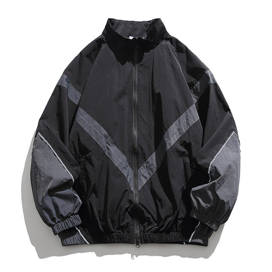 [Unisex] Oversize technische Wind- und Regenjacke mit Stehkragen, reflektierenden Paspeln und elastischem Saum Shop Nory