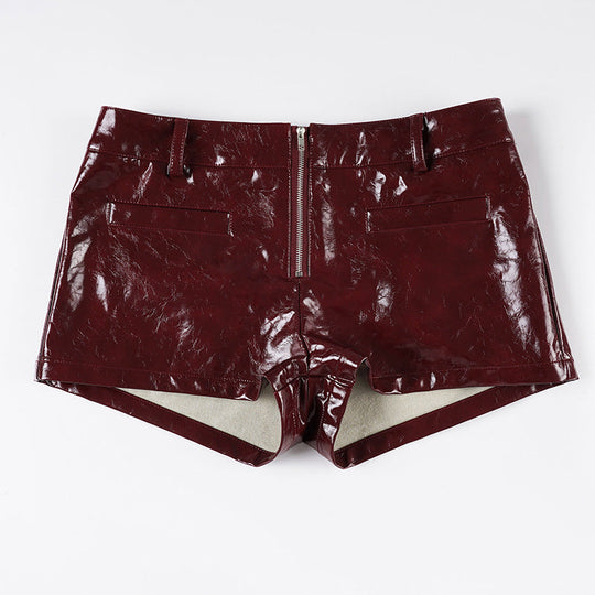 Damen Kunstleder-Shorts mit dekorativen Knopfdetails