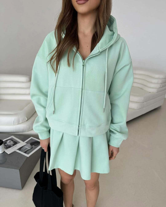 Damen Kurzzip-Kapuzenjacke mit plissiertem Minirock-Lounge-Set Shop Nory