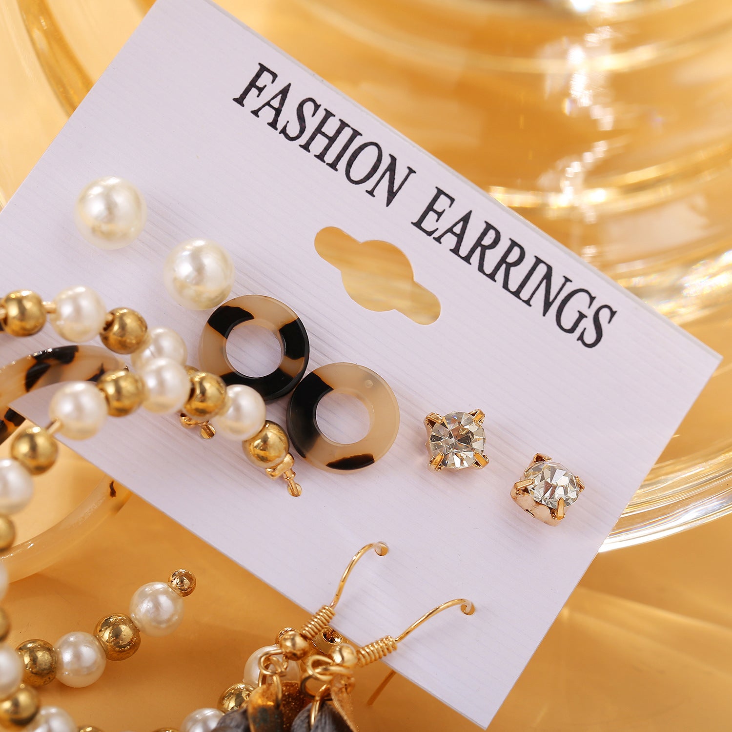 Damen Schmuckset mit verschiedenen Ohrsteckern und langen Quastenohrringen Shop Nory