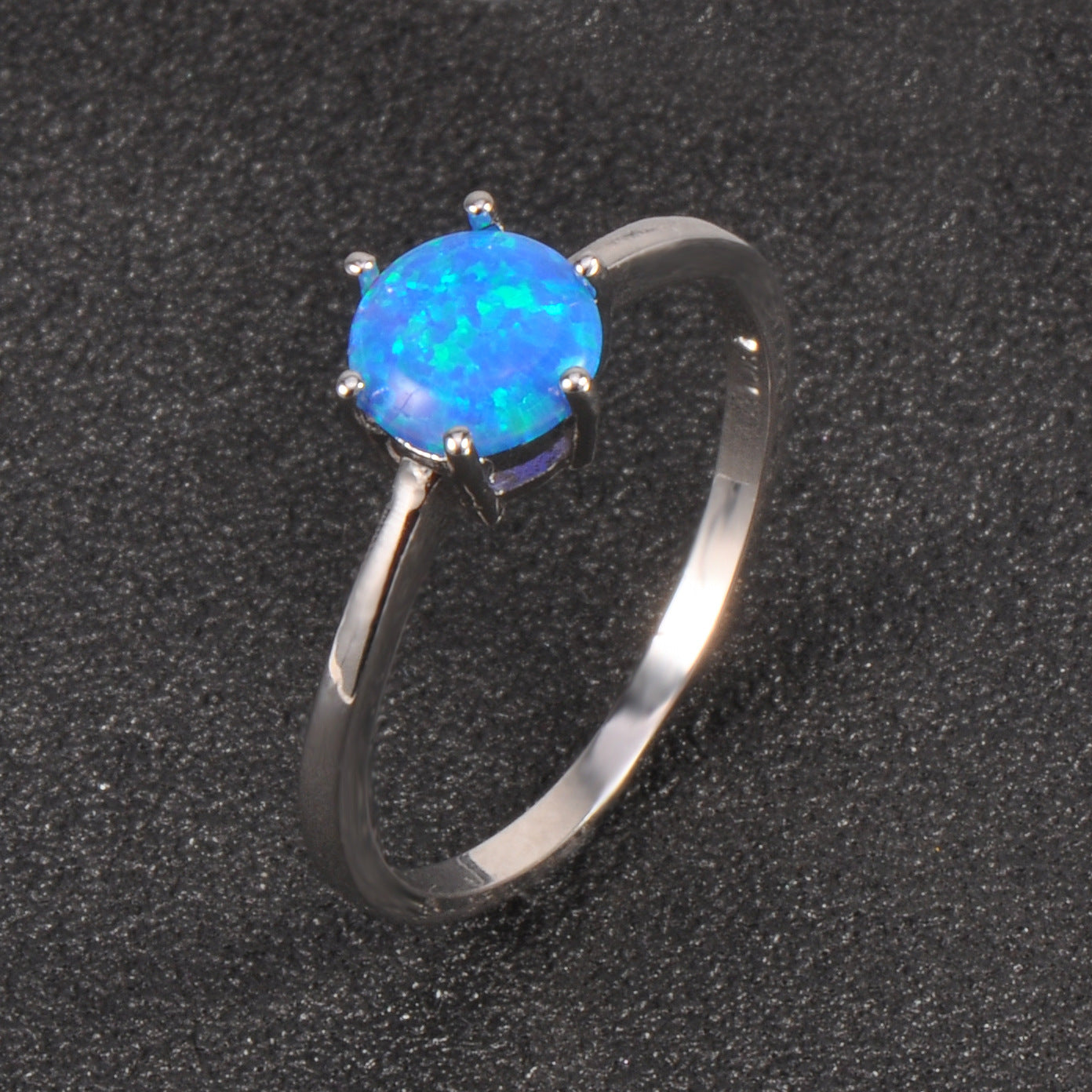 Damen Ring mit funkelndem Opal und eleganter Edelstahlfassung Shop Nory
