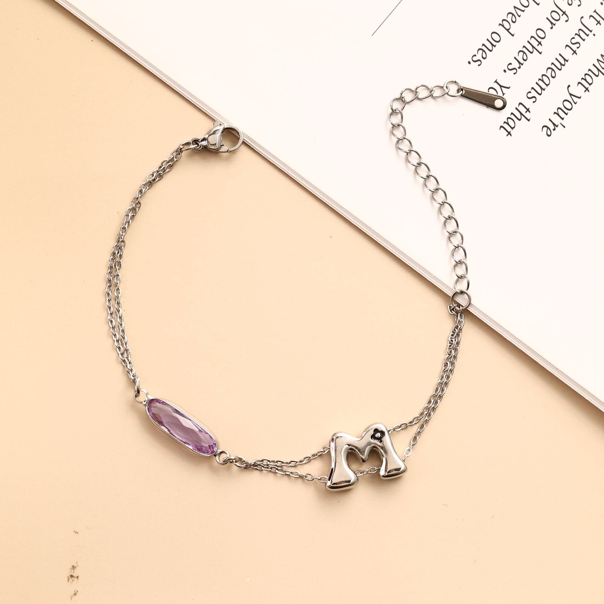 Damen Armbanduhr mit facettiertem Kristall und eleganter Schließe Shop Nory