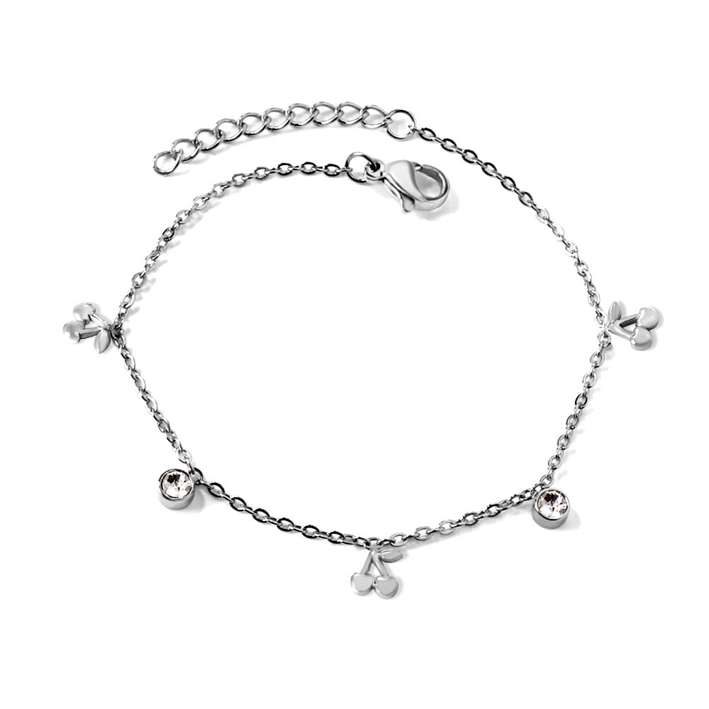 Damen zartes, goldplattiertes Armband mit funkelnden Zirkonia und herzförmigen Anhängern Shop Nory
