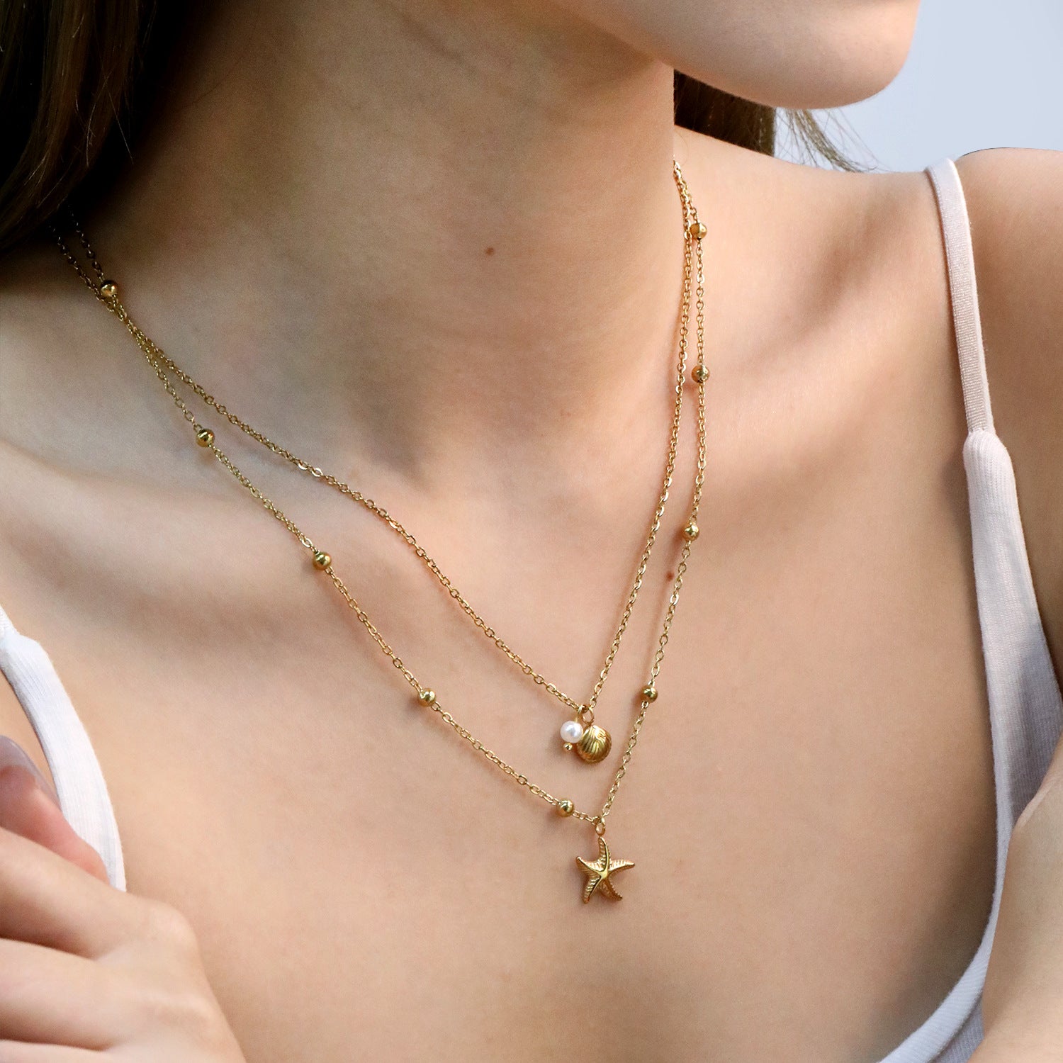Damen Halskette mit kunstvollen Muschel- und Sternenanhängern Shop Nory