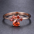 Damen Ring mit funkelndem orangefarbenem Stein und floralem Design Shop Nory