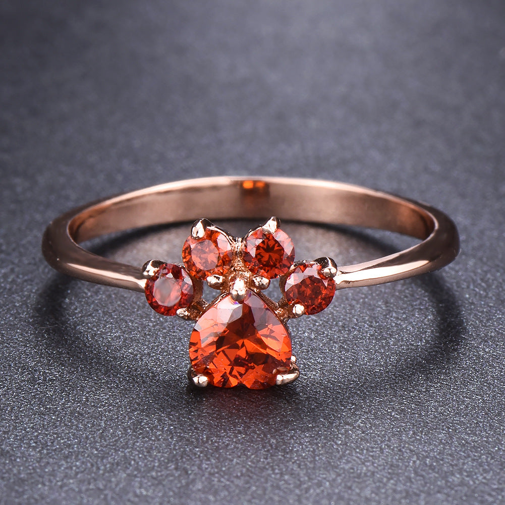 Damen Ring mit funkelndem orangefarbenem Stein und floralem Design Shop Nory