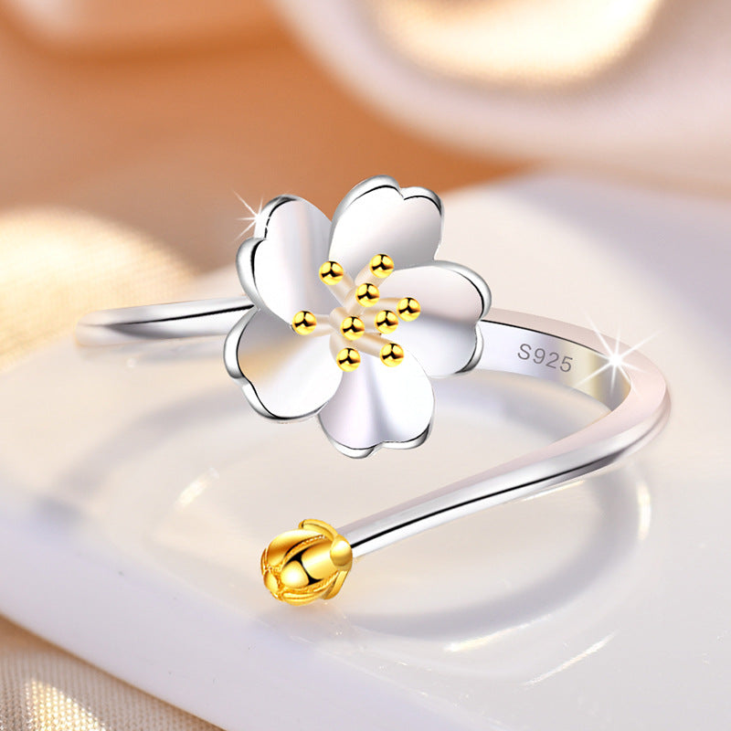 Damenring mit floralem Design und feiner Goldverzierung Shop Nory