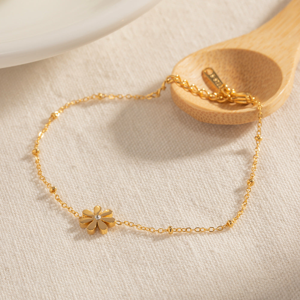 Damen Fußkettchen mit floralen Motiven und funkelndem Zirkonia Shop Nory