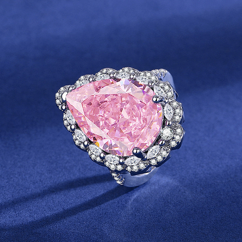 Damen eleganter und funkelnder Ring mit tropfenförmigem pinkem Stein Shop Nory