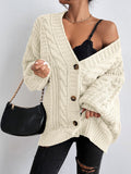 Damen Strickjacke mit oversized Passform und Zopfmuster