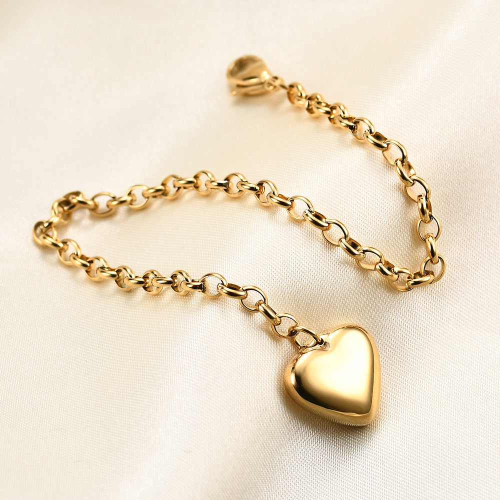 Damen Armband mit herzförmigem Charm aus hochwertigem Edelstahl Shop Nory