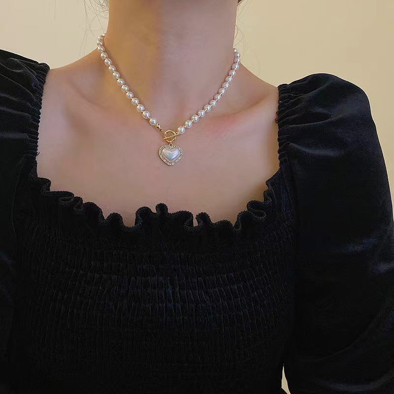 Damen elegante Perlenhalskette mit modischem Verschluss Shop Nory