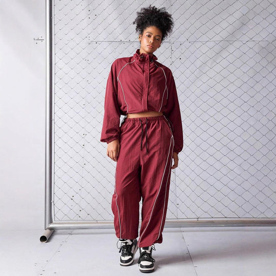 Damen sportives Cropped Windbreaker-Set mit Stehkragen Tunnelzug und reflektierenden Paspeln Shop Nory