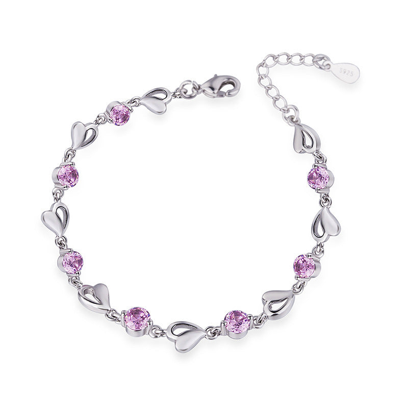 Damen Armband mit funkelnden Herz- und Zirkonia-Elementen Shop Nory