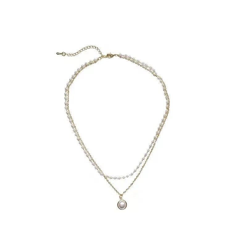 Damen Charmante und mehrlagige Perlenhalskette Shop Nory