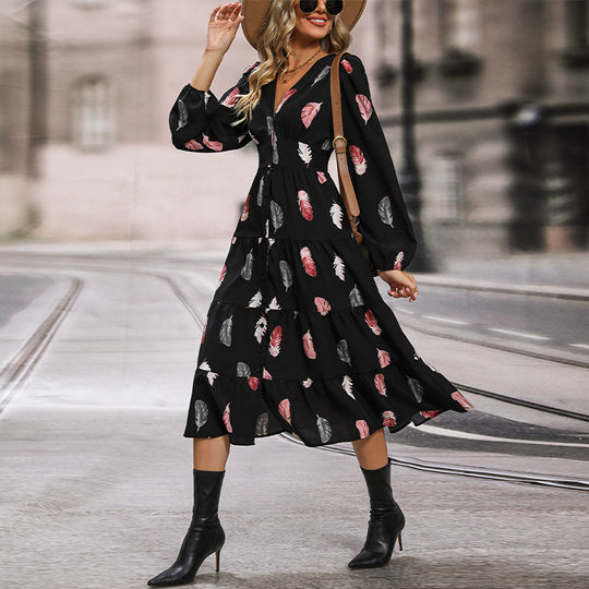 Damen Midikleid mit V-Ausschnitt, dreiviertel Ärmeln, Stufenrock und Federmuster Shop Nory