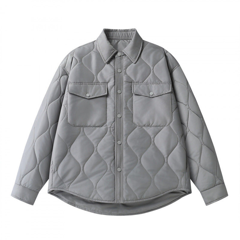 Unisex Gepolsterte gesteppte Hemdjacke mit Pattentaschen und abgerundetem Saum Shop Nory