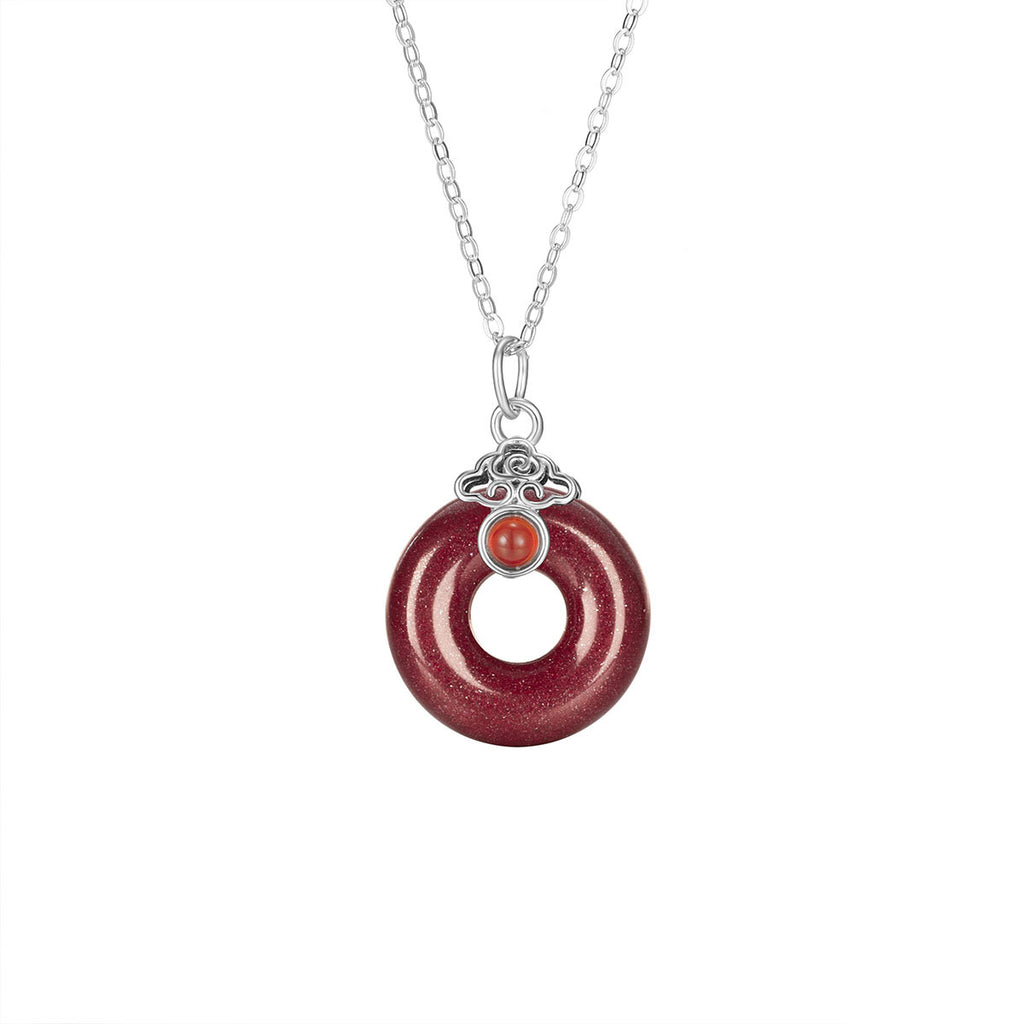 Damen Halsschmuck mit kunstvollem Donut-Anhänger aus hochwertigem Halbedelstein und Zirkonia-Details Shop Nory