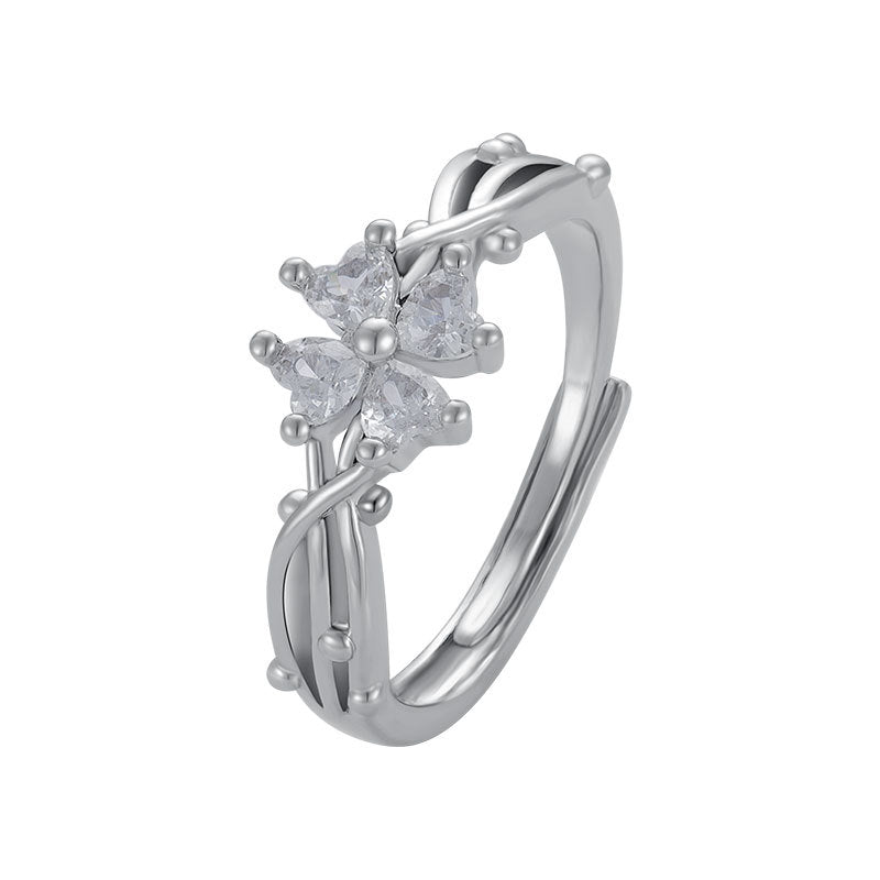 Damenring mit floralem Design und funkelnden pinken Zirkonia-Steinen Shop Nory