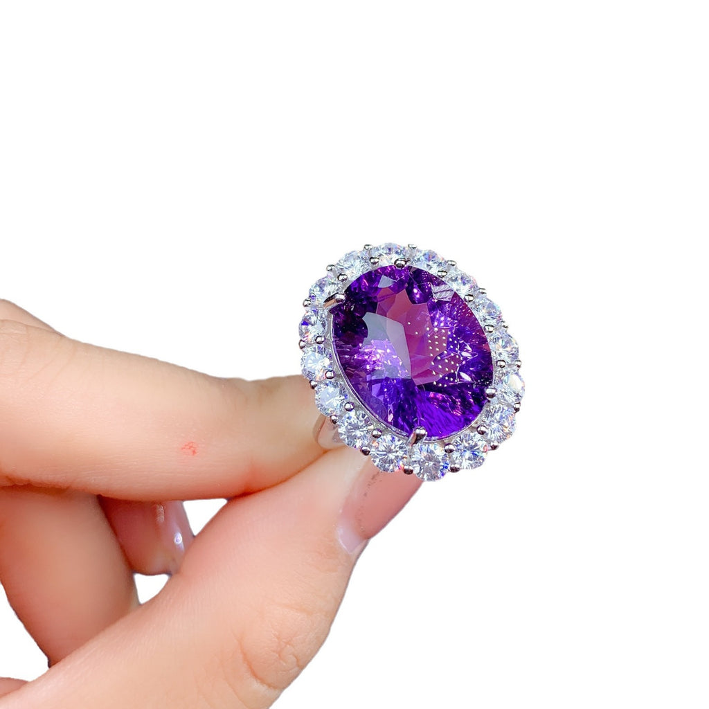 Damen glamouröser Schmuckring mit ovalem Amethyst und strahlenden Zirkonia Shop Nory