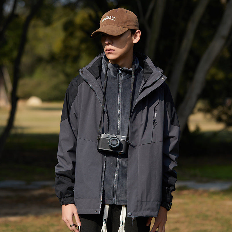 Damen zweilagige wasserabweisende Outdoorjacke mit Kapuze, Taillenregulierung und Kontrastbesätzen Shop Nory