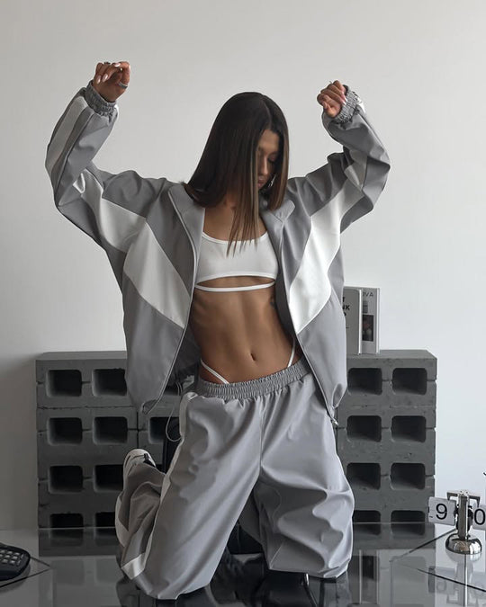 Damen sportives Zweiteiler-Set aus Oversize-Trackjacke mit Reißverschluss und weitem Bundfalten-Hose Shop Nory