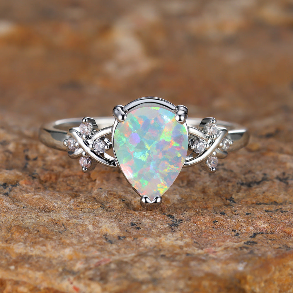 Damen Ring mit eleganter Opalstein-Fassung und zarten Zirkonia Shop Nory