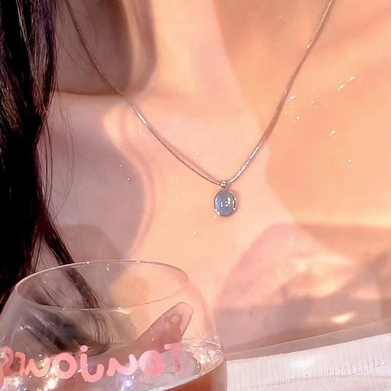 Damen Halskette mit ovalem Anhänger aus hochwertigem Edelstein und zarter Silberkette Shop Nory