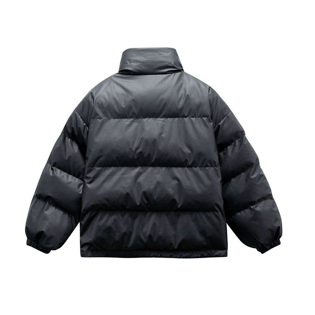 Unisex Boxy wattierte Oversize-Pufferjacke mit Stehkragen und Statement-Patchdetails Shop Nory