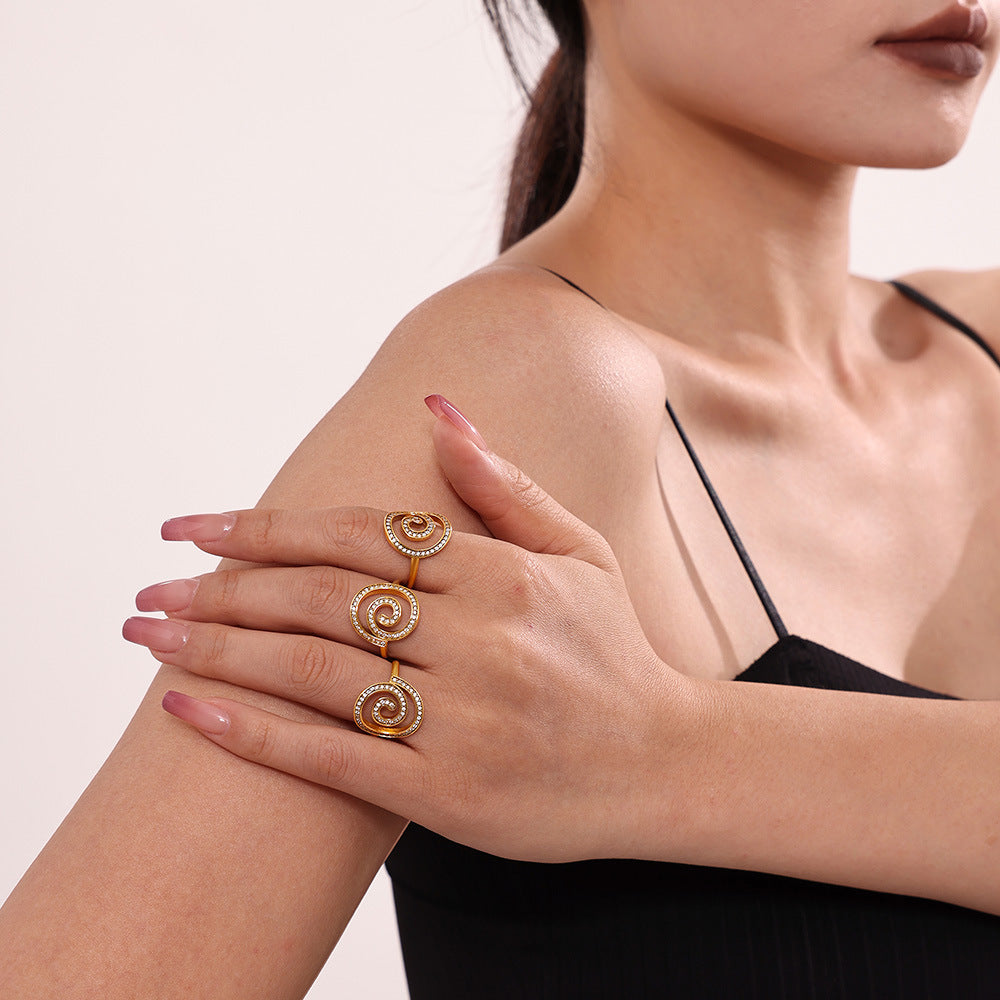 Damen Spiralring mit Zirkonbesatz und hochwertiger Edelstahl-Oberfläche Shop Nory