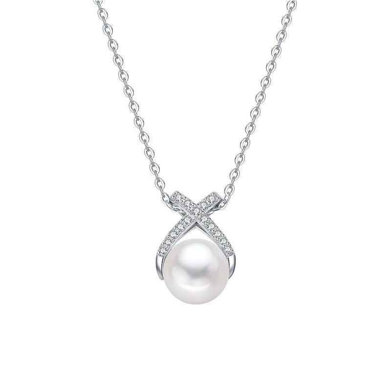 Damen Halskette mit funkelndem Perlenanhänger und eleganter Zirkonia-Fassung Shop Nory