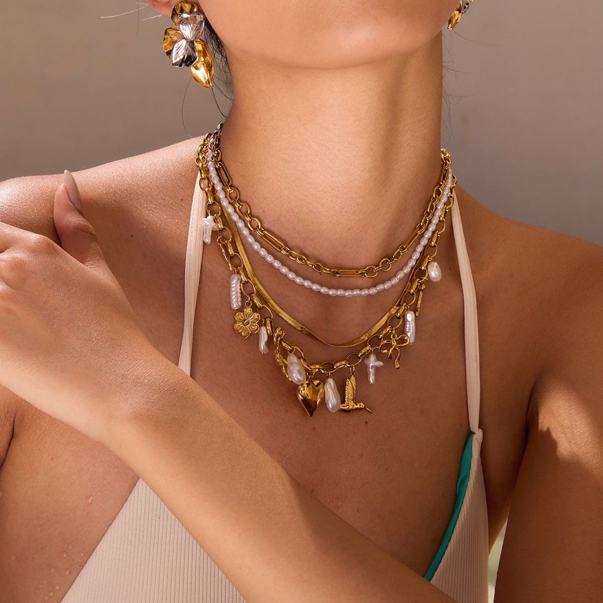 Damenkette mit verspielten Anhängern aus Edelstahl Shop Nory