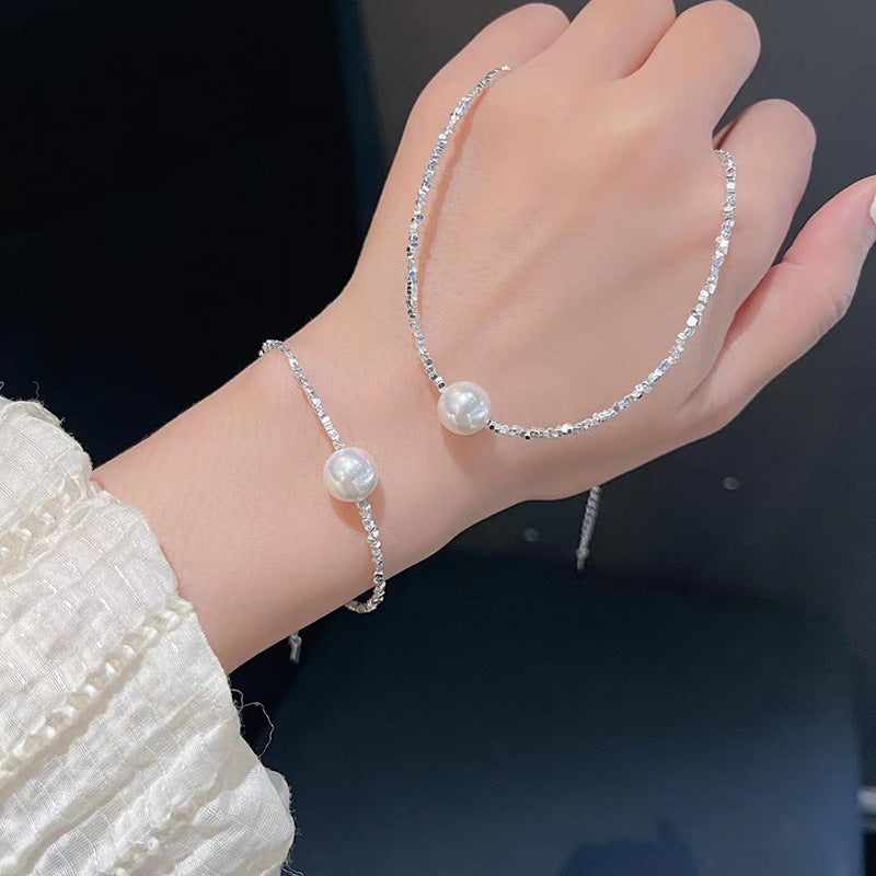 Damen Halskette mit eleganten Zirkonia-Details und Perlenakzent Shop Nory